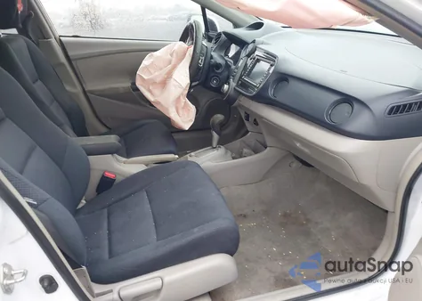 2010 Honda Insight Ex z USA, uszkodzony, nr VIN JHMZE2H73AS019636